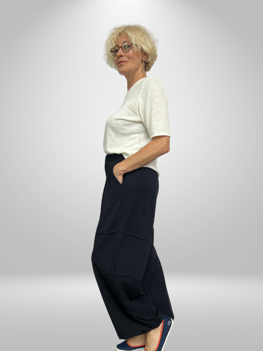 Upgrade your wardrobe with our Natural Munna Palazzo Pants (size 14-20). Made from 95% viscose, these lightweight and stretchy pants offer a comfortable fit and breathability for all-day wear. The adjustable elastic band allows you to control the flare, making it a versatile and stylish choice. Perfect for any occasion, these pants are a must-have for any fashion-forward individual.