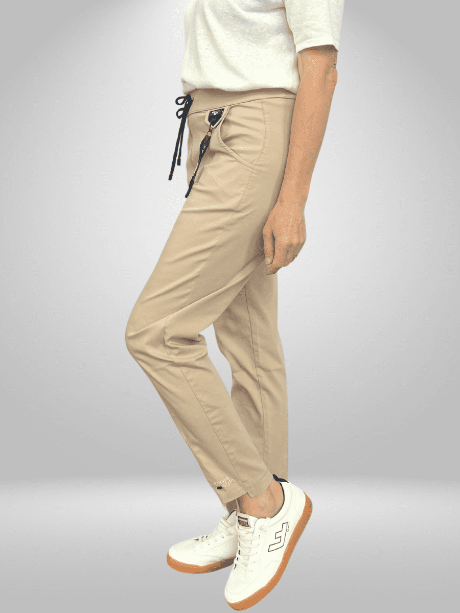 Introducing Munna Pants - the perfect combination of comfort and style. Made with lightweight and stretchy fabric, these pants provide a comfortable fit and breathability for all-day wear. Say goodbye to discomfort and hello to effortless style with Munna Pants.