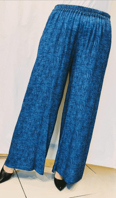 Upgrade your wardrobe with the BISA Palazzo Relaxed Fit Pants. Crafted from premium staple fabric, these pants offer the perfect blend of style and comfort. Designed with a relaxed fit, they provide effortless ease for all your daily activities. Elevate your comfort game with these must-have pants.