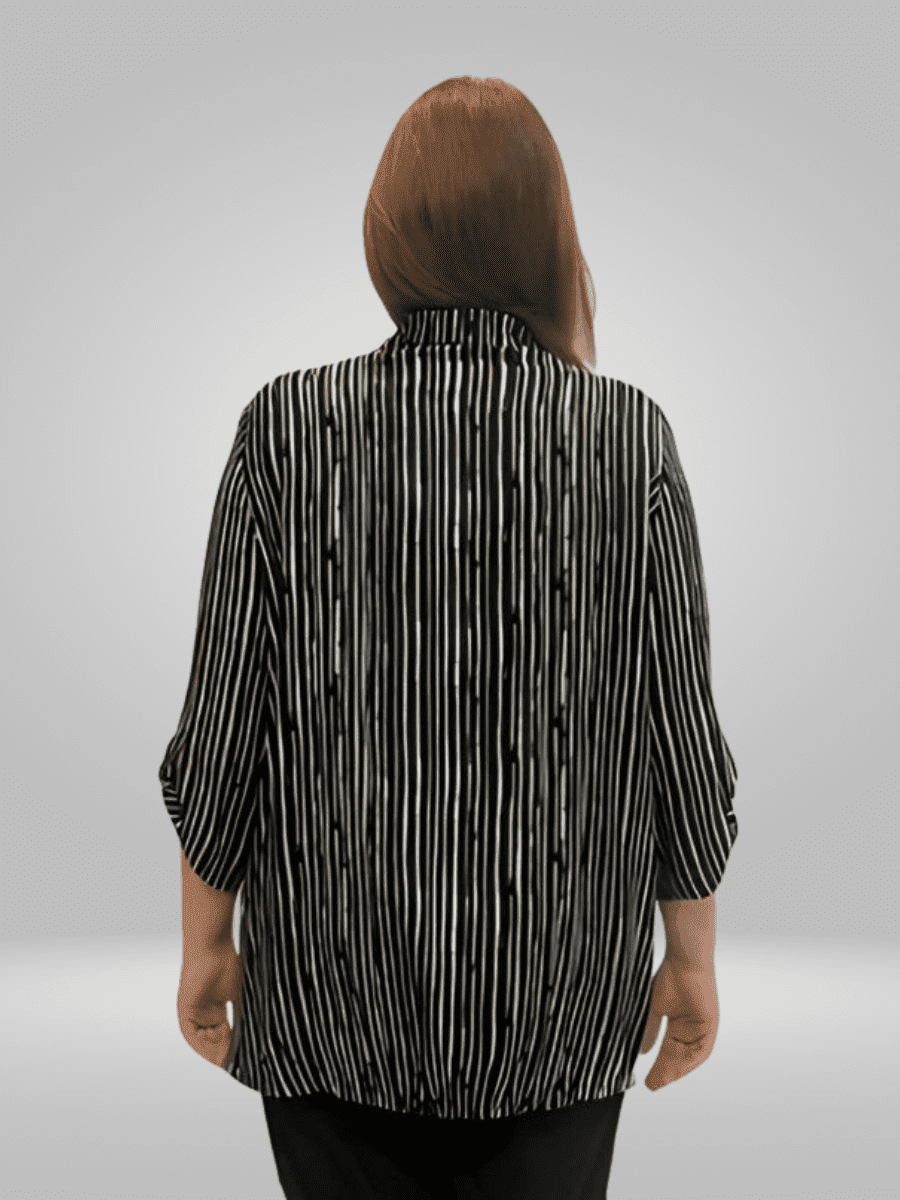 Upgrade your wardrobe with the BISA Blouse Relaxed Fit Shirt. Made with high-quality construction and a smooth, lightweight fabric, this shirt offers an effortless and comfortable fit. Perfect for all-day wear, this chic staple piece is a must-have for any fashion-forward individual.