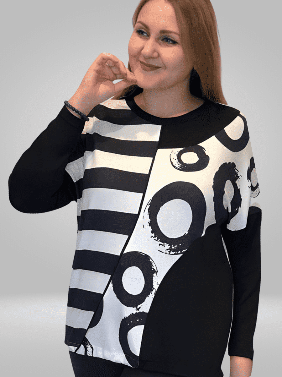 Introducing the BISA Blouse - a must-have addition to your wardrobe. Made from high-quality fabric, this blouse offers both comfort and style. Its lightweight design makes it perfect for daily office wear, while its classic silhouette guarantees a timeless look. Elevate your fashion game with the BISA Blouse.