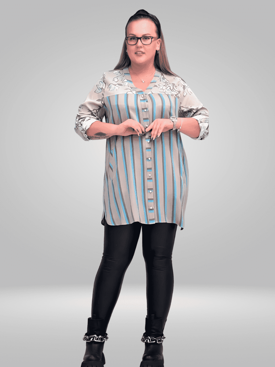 Upgrade your wardrobe with the Ay-Sel Plus Size Tunic, a versatile and comfortable piece for everyday wear. Made with a breathable cotton blend fabric, this tunic offers a relaxed fit and lasting comfort. Perfect for any occasion, this tunic is a must-have for any fashion-forward plus size wardrobe.