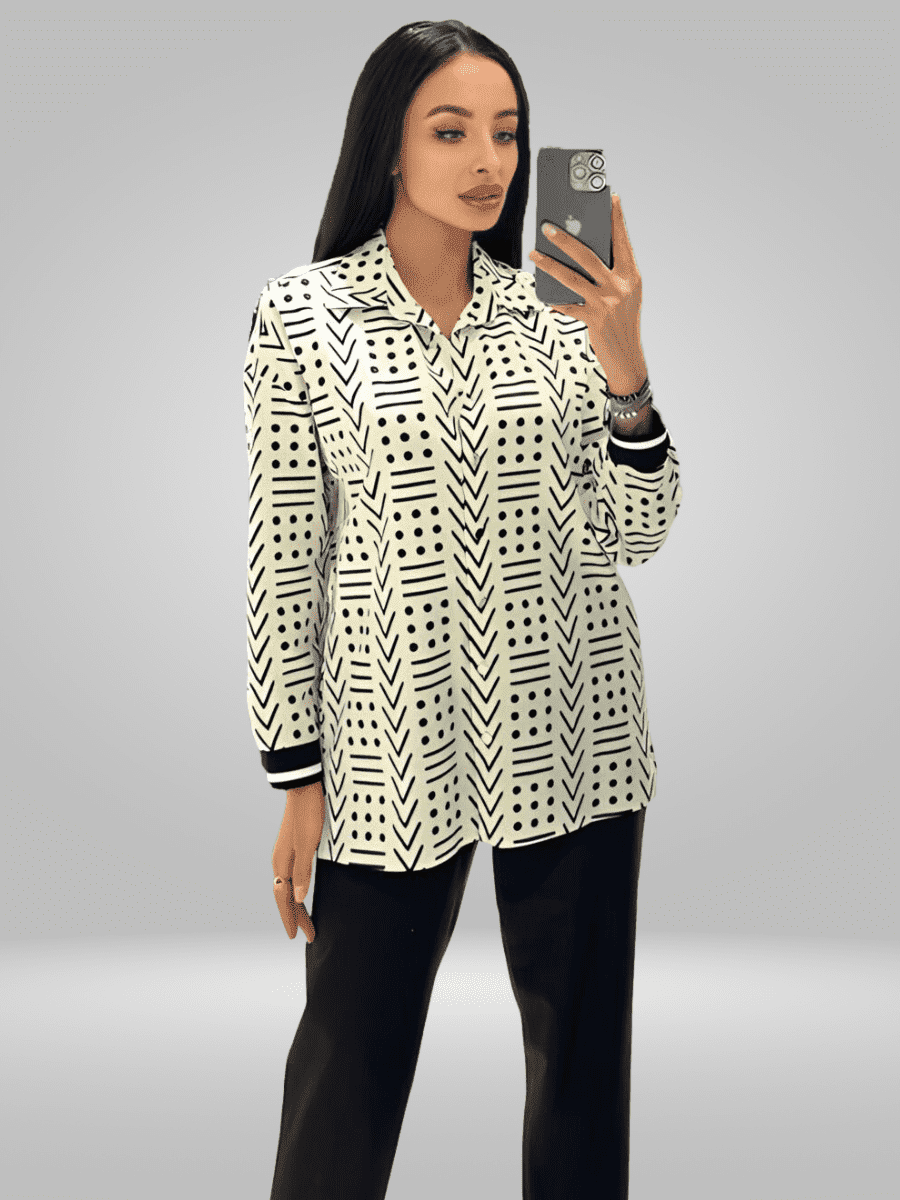Introducing the Pienna Plus Size Blouse - a lightweight and breathable option for all-day comfort. Made with a comfortable fit in mind, this blouse is perfect for any occasion. Shop now and elevate your wardrobe with this must-have piece.
