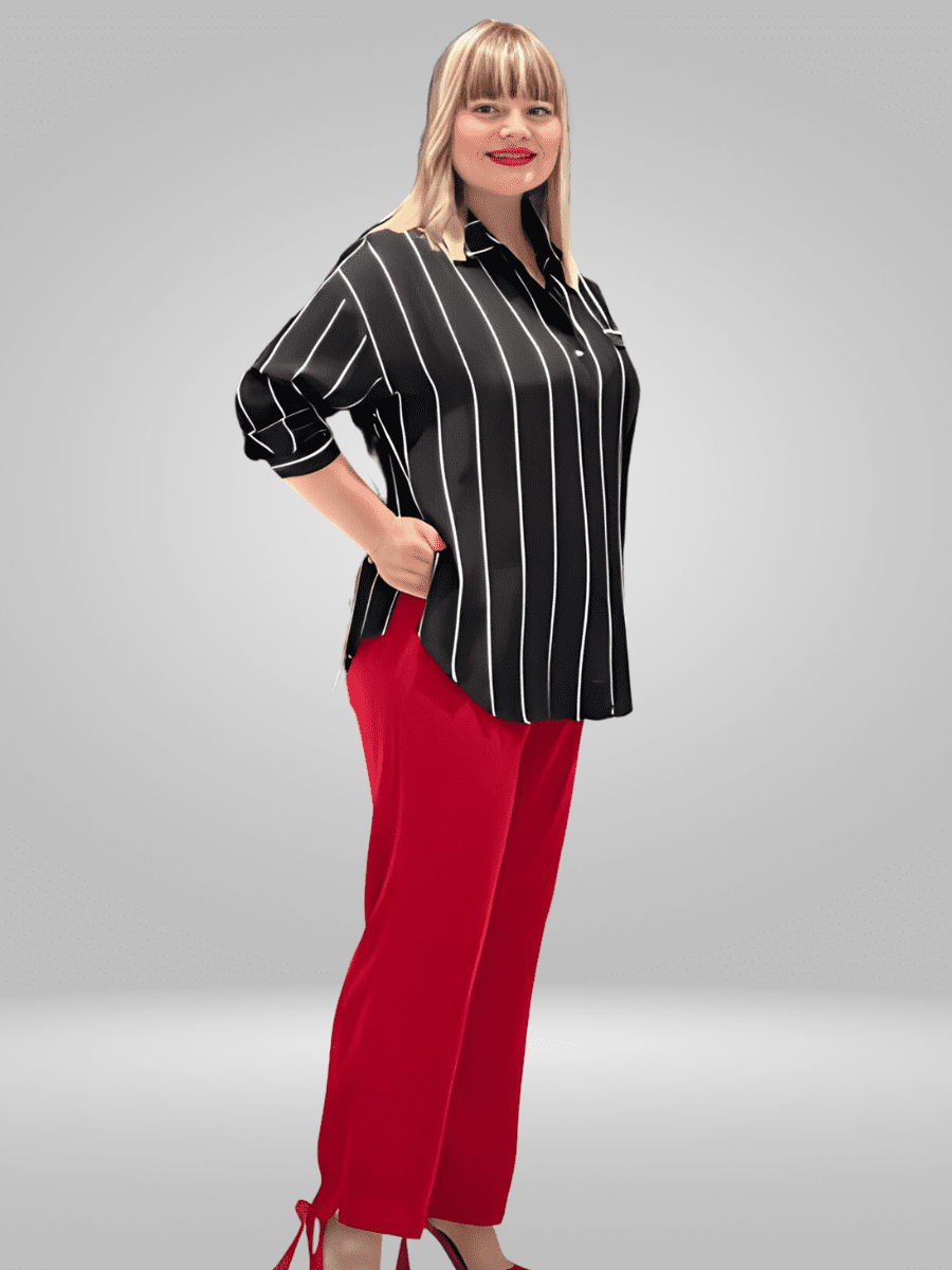 Introducing the Pienna Plus Size Blouse - a lightweight and breathable option for all-day comfort. Made with a comfortable fit in mind, this blouse is perfect for any occasion. Shop now and elevate your wardrobe with this must-have piece.