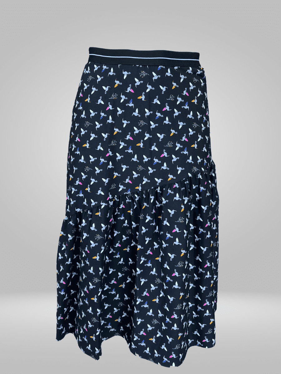 Introducing the Pienna Skirt (12-18), a sophisticated and versatile piece featuring a high-waisted silhouette. Made from a lightweight and comfortable fabric, this skirt can be dressed up or down for any event. Elevate your wardrobe with this timeless and chic addition.