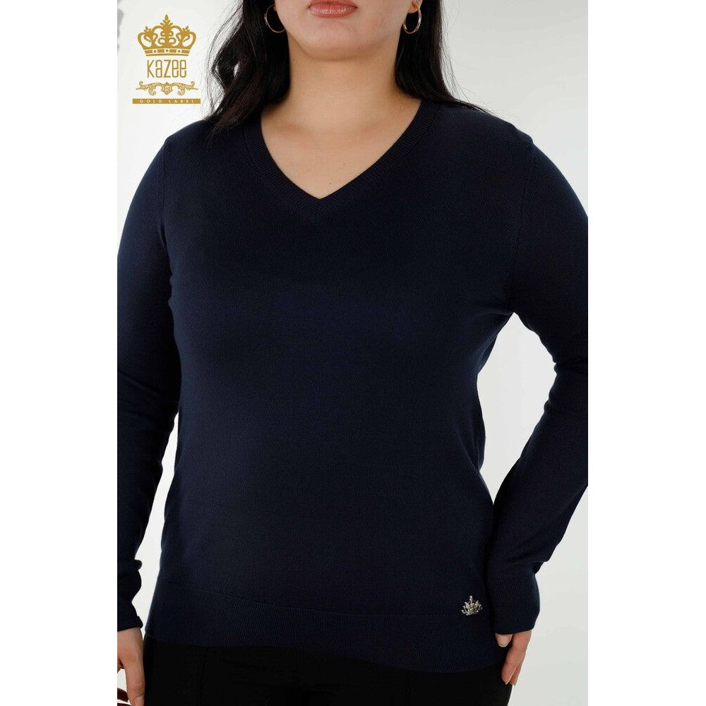 Stay cozy and stylish in the Kazee Blouse from Saks. Made with a blend of 92% viscose and 8% elite materials, this women's knitwear sweater features a basic logo design. The model is 1.65 cm tall with a bust of 106 cm, waist of 91 cm, and hips of 110 cm. Perfect for any occasion, this sweater is a must-have for your wardrobe. Shop now at Saks.