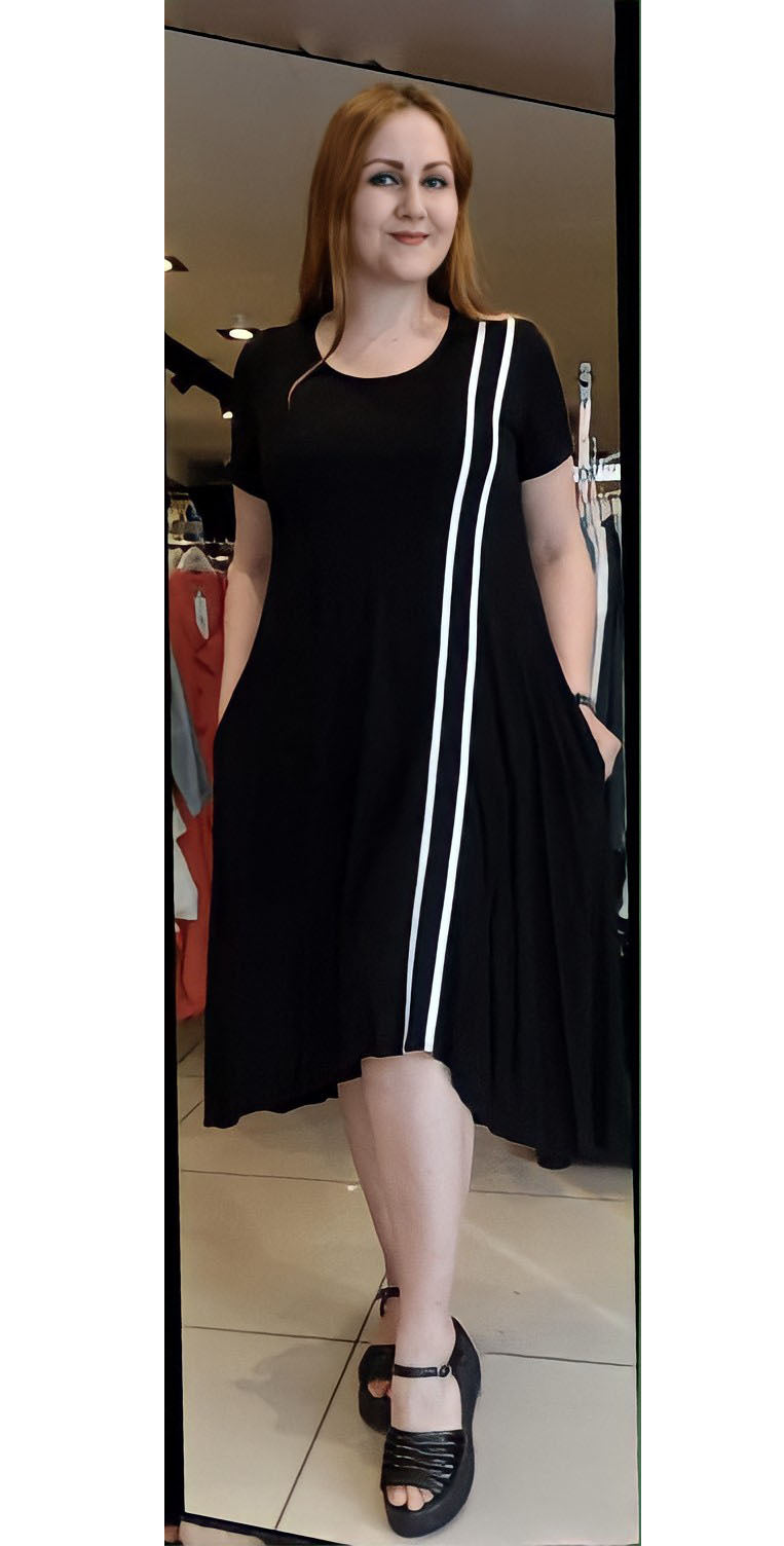 Discover the versatile and stylish BISA Plus Size Dress, featuring a high-waisted silhouette and premium lightweight fabric for ultimate comfort. Perfect for any occasion, this elegant garment can be dressed up or down for a timeless and sophisticated look. Shop now and elevate your wardrobe with this must-have piece.