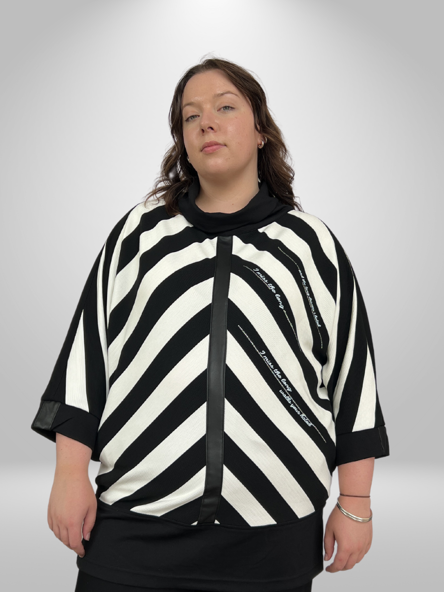 Plus Size Women's Tunic, Sizes 20-24 NZ/UK, Made with sublime blend of 95% Cotton and 5% Elastane. This Tunic has sleek design incorporating white diagonal lines that is sure to empower one's style and confidence. This tunic is amazing for both the formal occasion as well as casual outings, thanks to its comfortable fit.