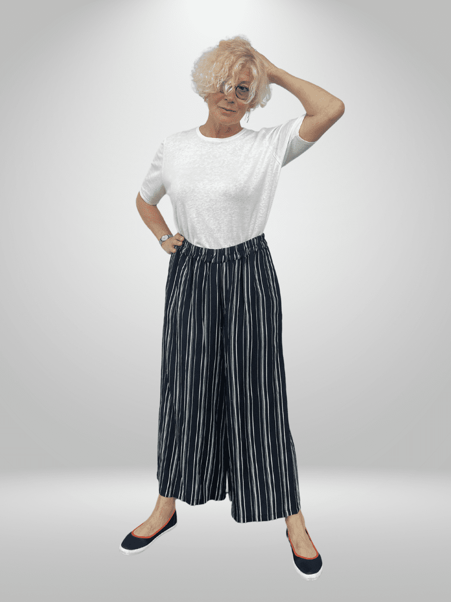 Upgrade your wardrobe with the BISA Palazzo Relaxed Fit Pants, perfect for both comfort and fashion. These pants offer a relaxed fit and are available in various sizes. Add a touch of elegance to your outfit with these versatile pants. Measurements are available upon request. Shop now and elevate your style game!