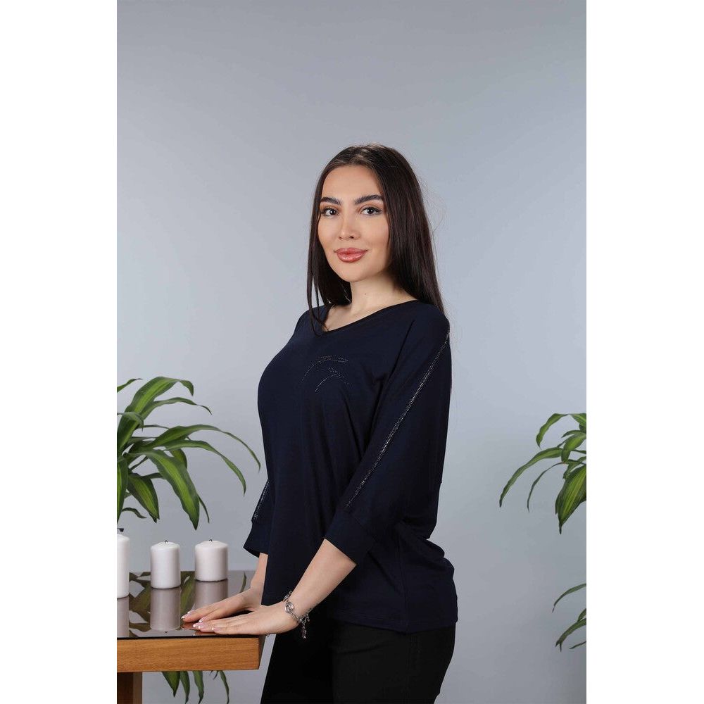 Introducing the Kazee Blouse for women, made with 97% viscose and 3% elastane for a comfortable and flattering fit. Featuring the Kazee logo on a V-neck and long sleeves, this blouse is perfect for any occasion. Made with combed cotton for a soft and luxurious feel. Shop now and elevate your wardrobe with this must-have piece.