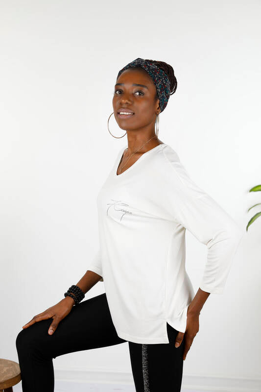 Introducing the Kazee Blouse - a stylish and comfortable addition to your wardrobe. This women's blouse features a crew neck and long sleeves, with letter detailing for a unique touch. Made from 95% viscose and 5% elastane for a soft and stretchy fit. Perfect for any occasion, this blouse is a must-have for any fashion-forward woman. Shop now and elevate your style game!