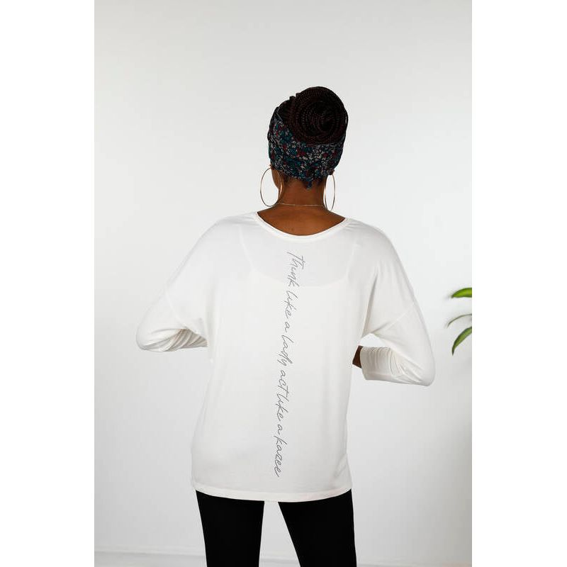Introducing the Kazee Blouse - a stylish and comfortable addition to your wardrobe. This women's blouse features a crew neck and long sleeves, with letter detailing for a unique touch. Made from 95% viscose and 5% elastane for a soft and stretchy fit. Perfect for any occasion, this blouse is a must-have for any fashion-forward woman. Shop now and elevate your style game!