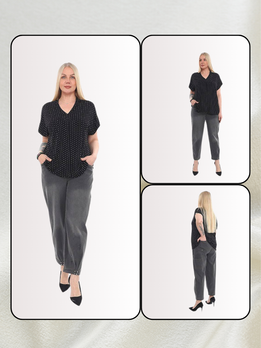 A plus-size model wearing a black polka dot blouse (sizes 20-26), featuring a V-neckline and breathable lightweight fabric, paired with grey trousers.