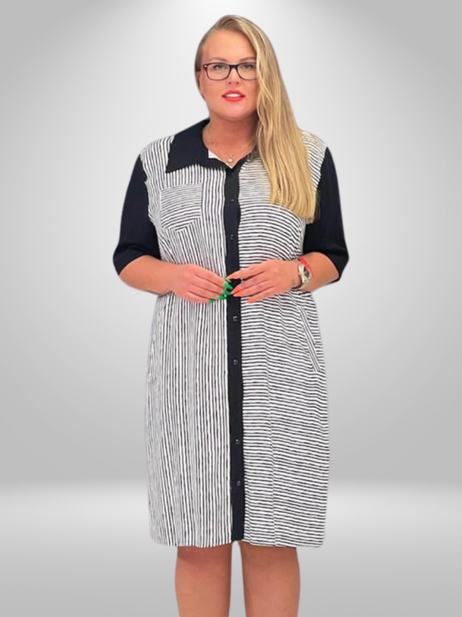 A curvy woman wearing the Ay-Sel Striped Midi Plus Size Dress with Contrast Sleeves, showcasing the trendy curvy fashion dress in New Zealand.