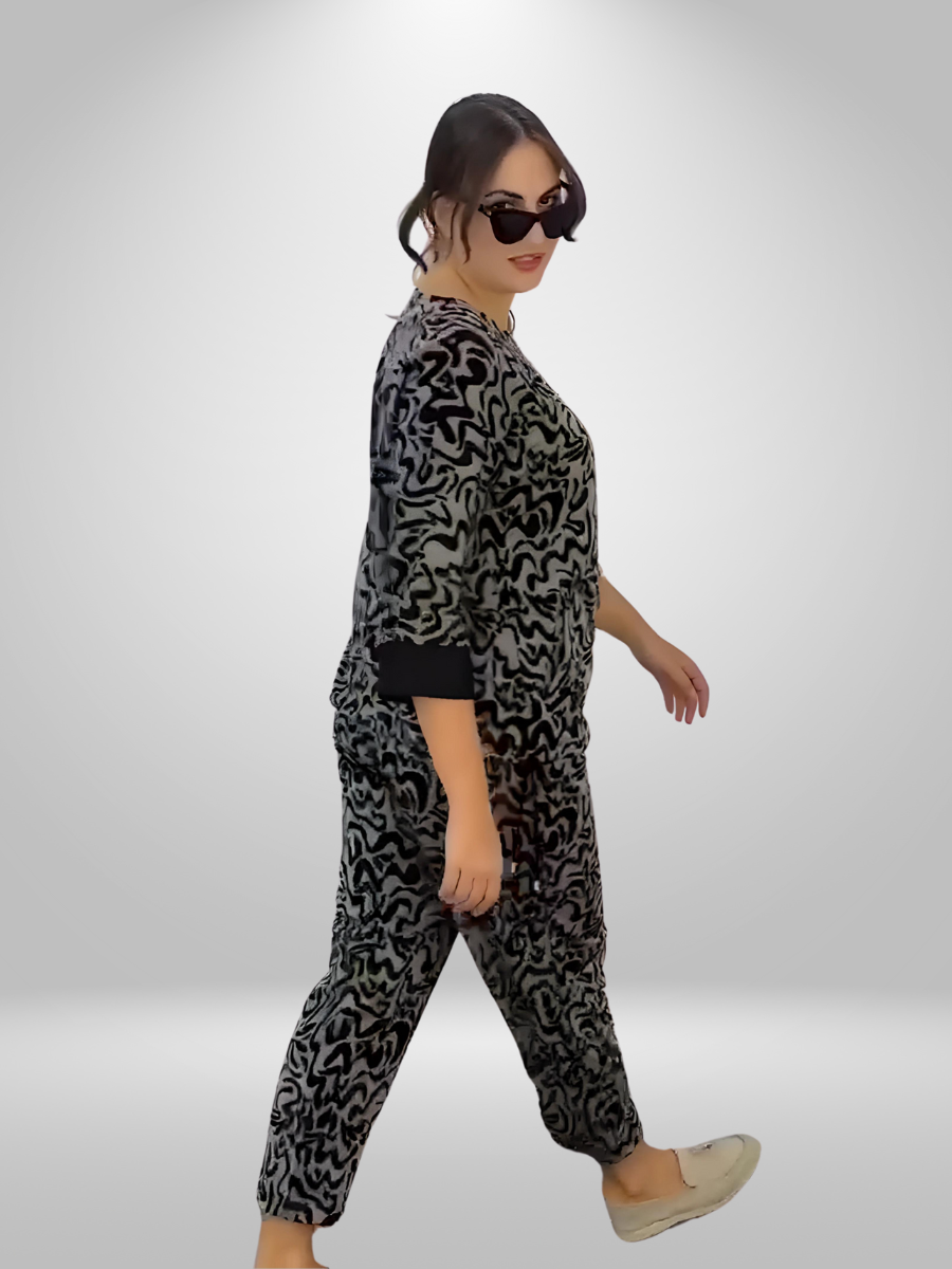 Darkwin Abstract Print Plus Size Pants in sizes 18-20, showcasing the distinctive design and fabric blend for a detailed view of their quality and fashion-forward appeal.