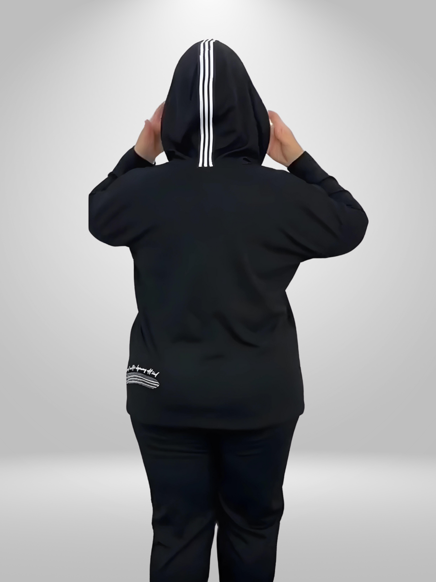 A stylish Darkwin Cheshire Cat women's hoodie and pants set in sizes 16-20, crafted from a blend of 75% viscose and 25% polyester, featuring a playful cat design on comfortable, warm fabric.