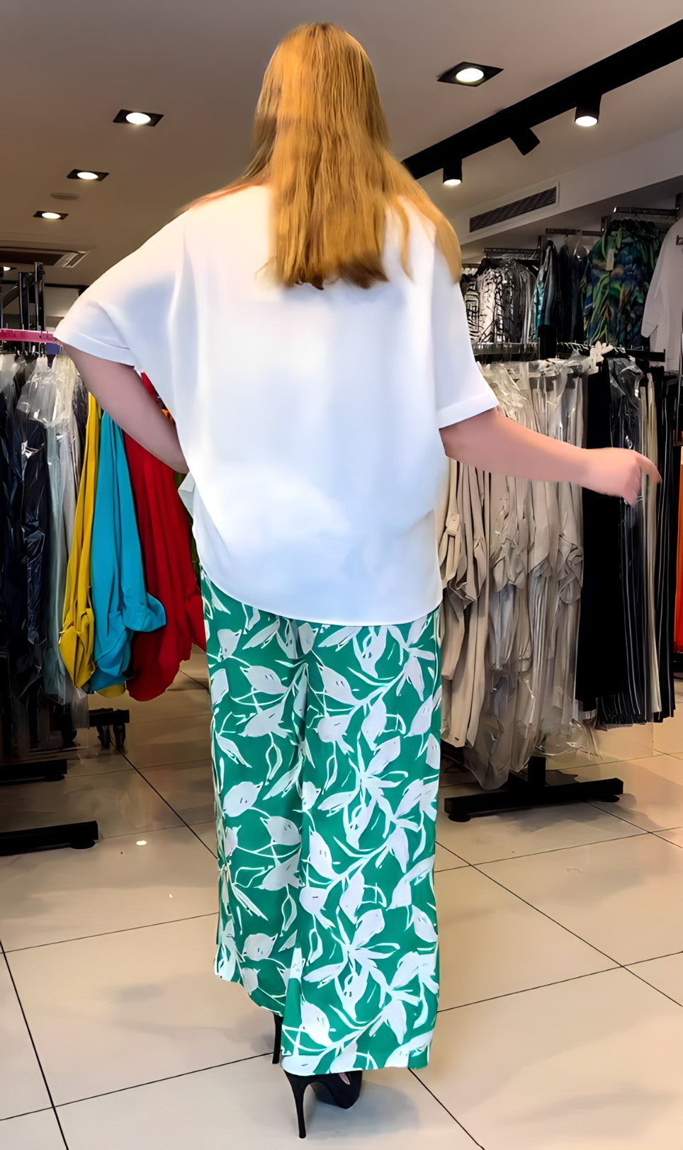 Upgrade your office wardrobe with the BISA Blouse and Pants Set. This set includes a silky smooth blouse, stylish pants, and an amulet trinket for added flair. The lightweight design makes it perfect for everyday wear, while the classic design ensures a timeless look. Elevate your style and feel confident in this versatile and chic set.