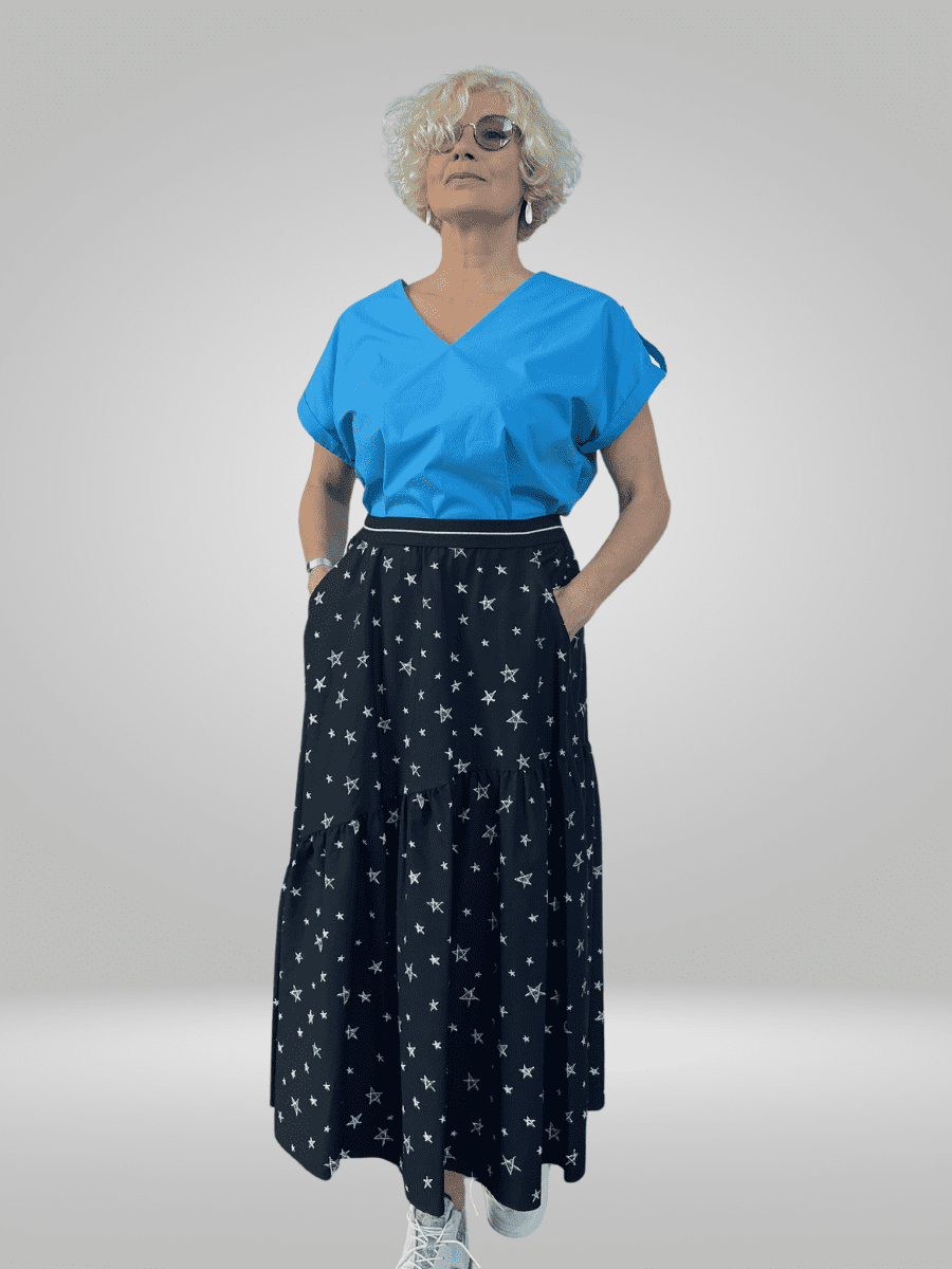 Introducing the Pienna Skirt (12-18), a sophisticated and versatile piece featuring a high-waisted silhouette. Made from a lightweight and comfortable fabric, this skirt can be dressed up or down for any event. Elevate your wardrobe with this timeless and chic addition.