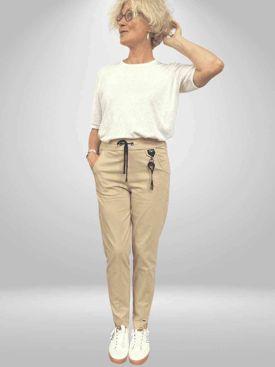 Introducing Munna Pants - the perfect combination of comfort and style. Made with lightweight and stretchy fabric, these pants provide a comfortable fit and breathability for all-day wear. Say goodbye to discomfort and hello to effortless style with Munna Pants.