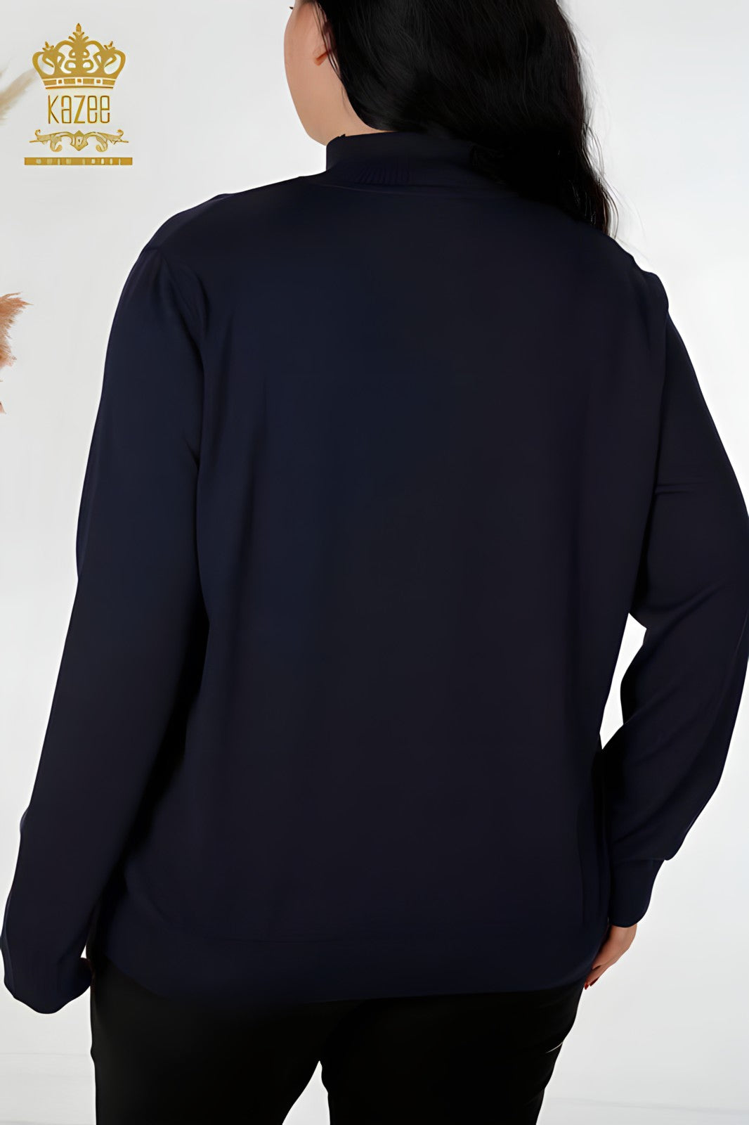 Stay cozy and stylish with Kazee's Women's Knitwear Sweater in a beautiful plum color. Made with 92% viscose and 8% elite materials, this high collar sweater is both comfortable and chic. Perfect for any occasion, this sweater is a must-have for your wardrobe. Model is 174cm tall and has a bust of 108cm, hips of 116cm, and waist of 87cm. Add this versatile and fashionable sweater to your collection today!
