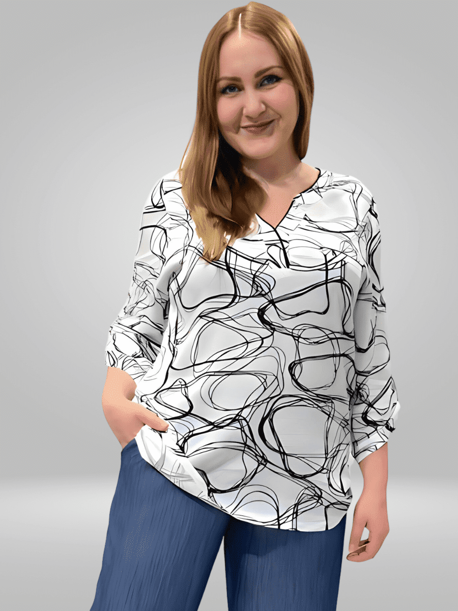 Introducing the BISA Blouse - a must-have addition to your wardrobe. Made from high-quality fabric, this blouse offers both comfort and style. Its lightweight design makes it perfect for daily office wear, while its classic silhouette guarantees a timeless look. Elevate your fashion game with the BISA Blouse.