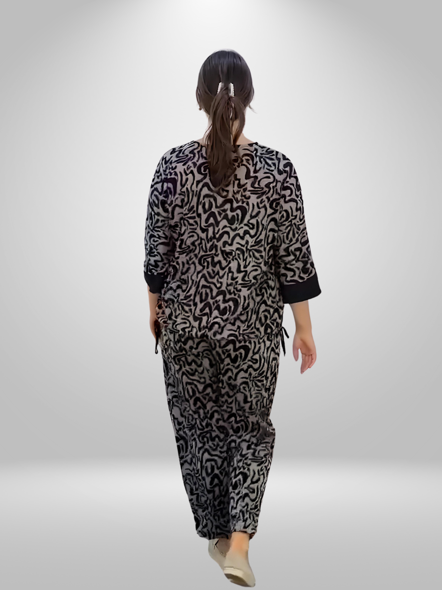 Darkwin Abstract Print Plus Size Pants in sizes 18-20, showcasing the distinctive design and fabric blend for a detailed view of their quality and fashion-forward appeal.